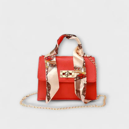 Bolso de mano de cuero marrón elegante con cierre dorado