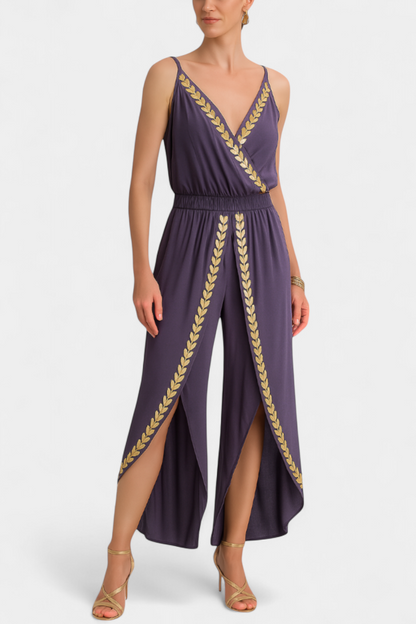 Saria – Vestido tipo jumpsuit con detalles dorados y cortes en las piernas