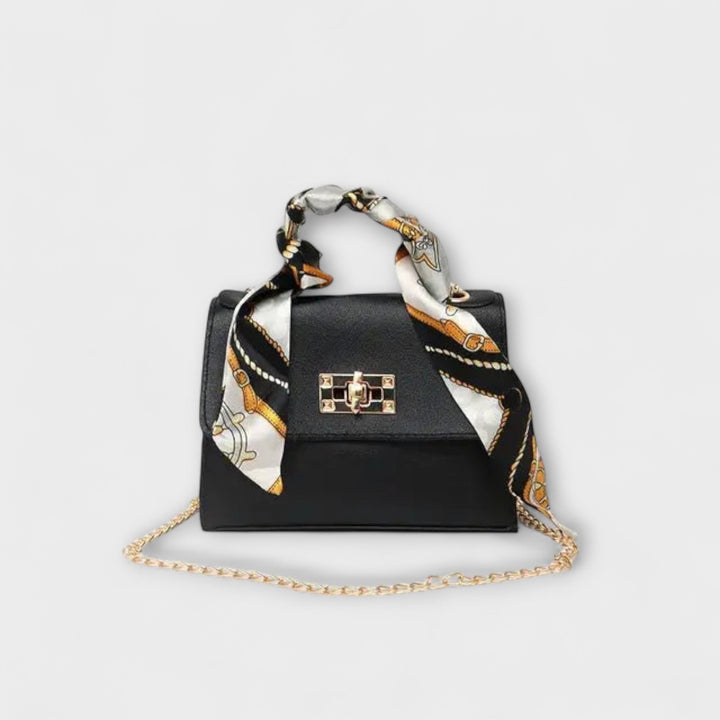 Bolso de mano de cuero marrón elegante con cierre dorado